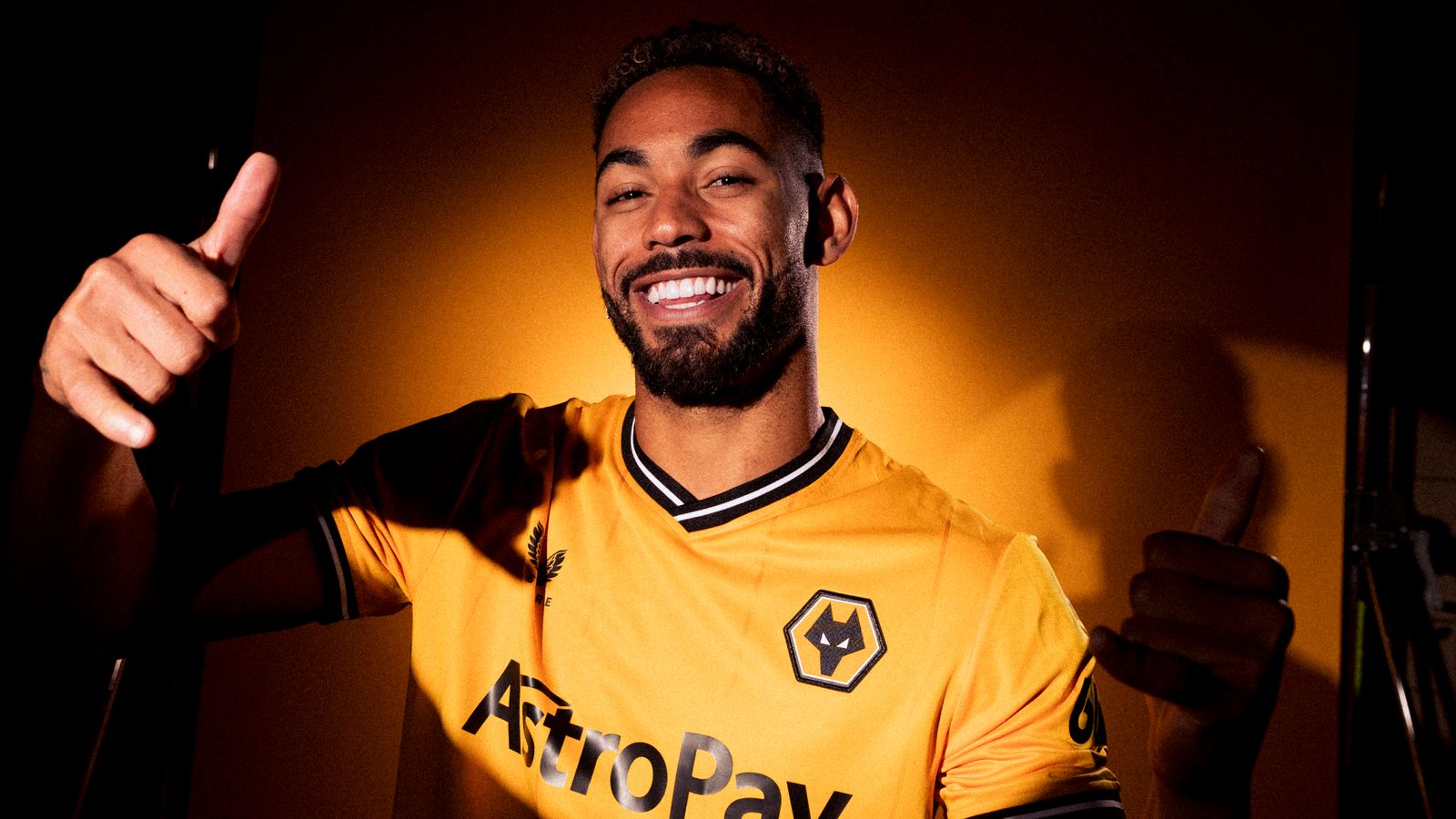 Matheus Cunha of Wolverhampton Wanderers poses for a portrait in the 2023/24 Home Kit during media access day at Molineux on August 03, 2023 in Wolverhampton, England.